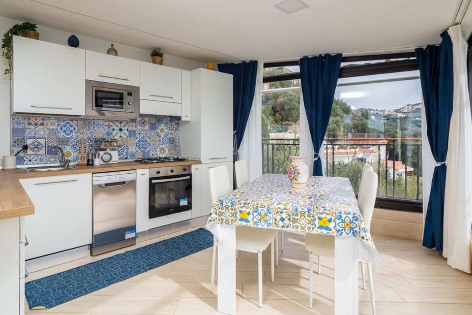 Panoramic Villa | Private kitchen | Full-size fridge, microwave, oven, stovetop