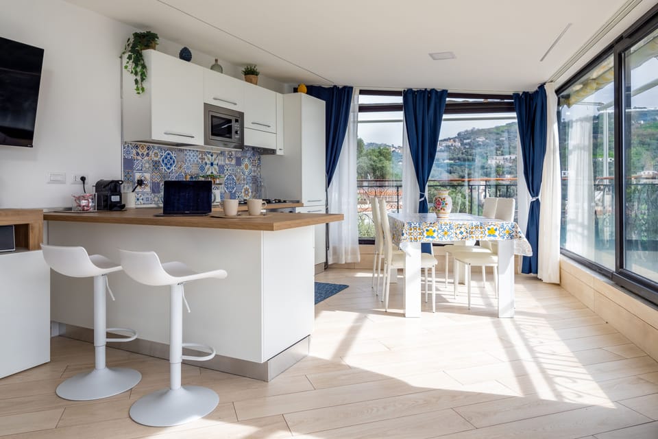 Panoramic Villa | Living area | 50-inch flat-screen TV with digital channels