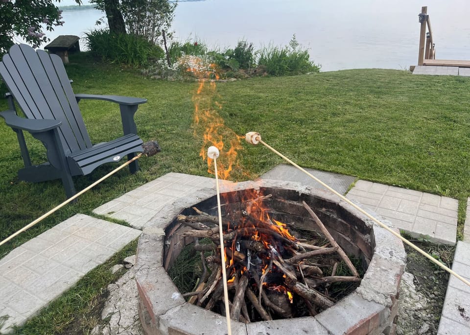 Roast marshmallows with your family and/or friends, and you enjoy the lake view.