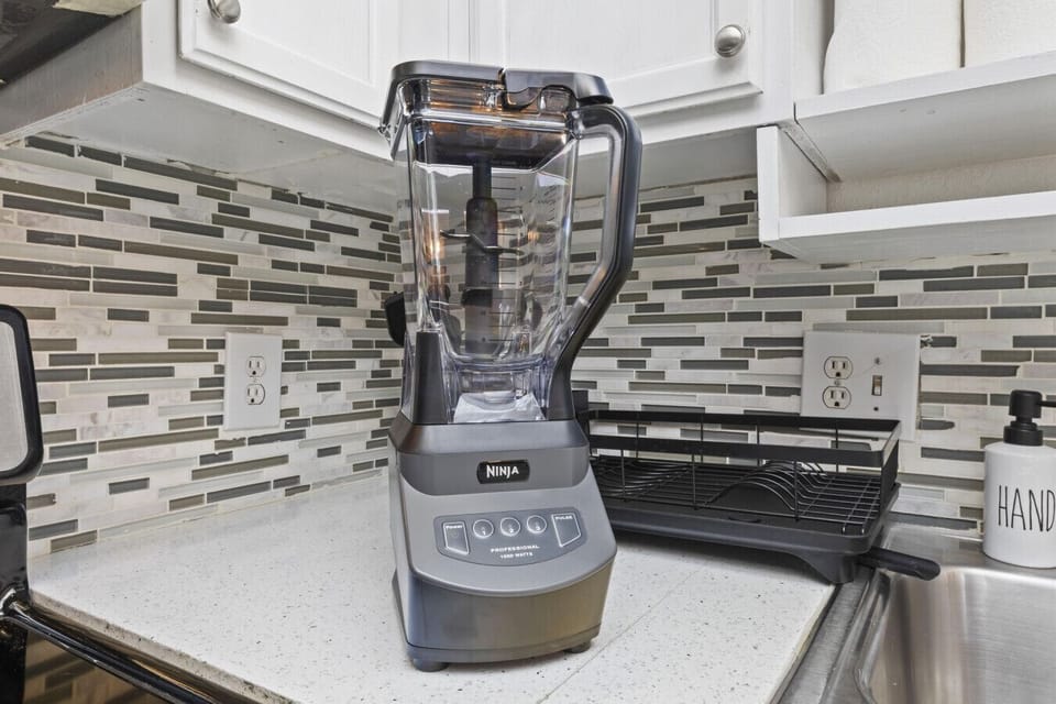 Kick off your vacation mornings with a fresh smoothie or a protein shake! Our kitchen comes equipped with a high-powered Ninja blender, making it easy to keep up with your wellness routine even while away from home.