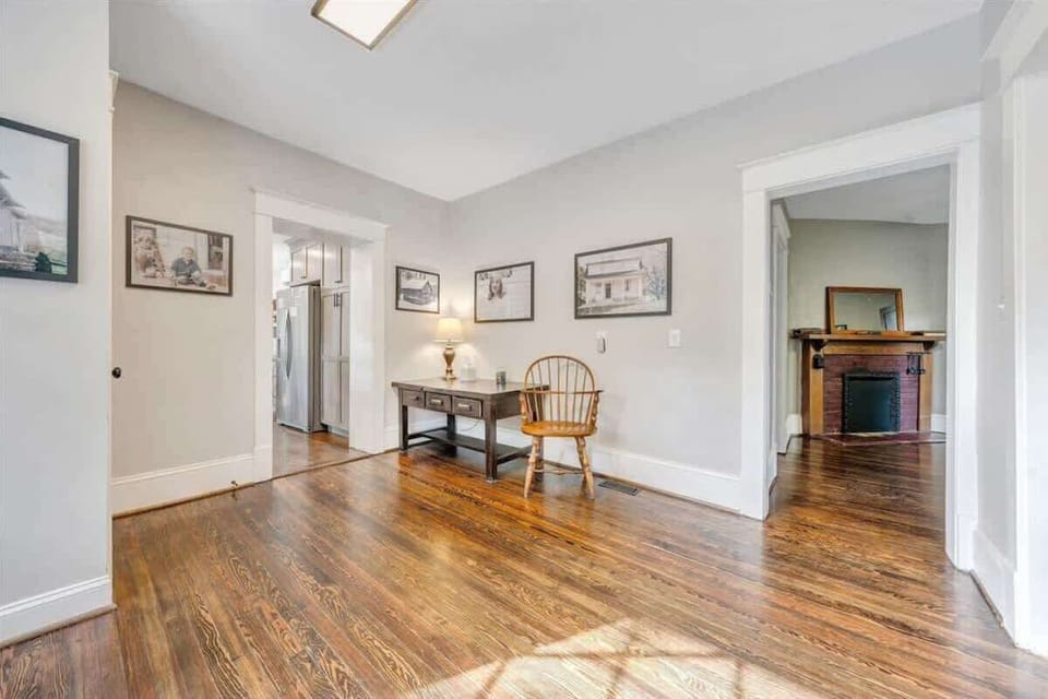 Entry hallway with wooden floors