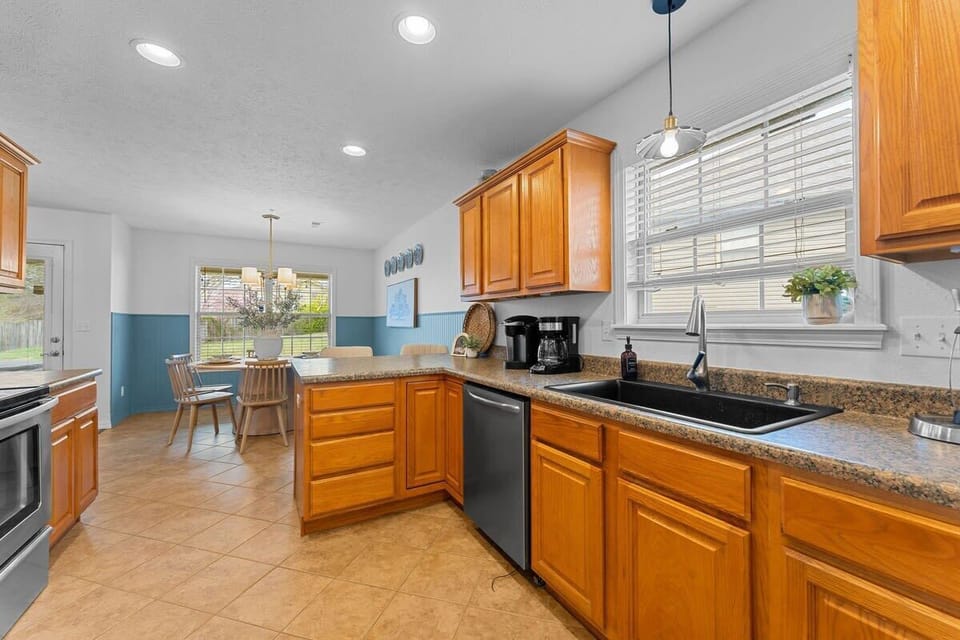 The kitchen comes fully stocked with all the utensils, pots/pans, and small appliances you need to cook up your favorites!