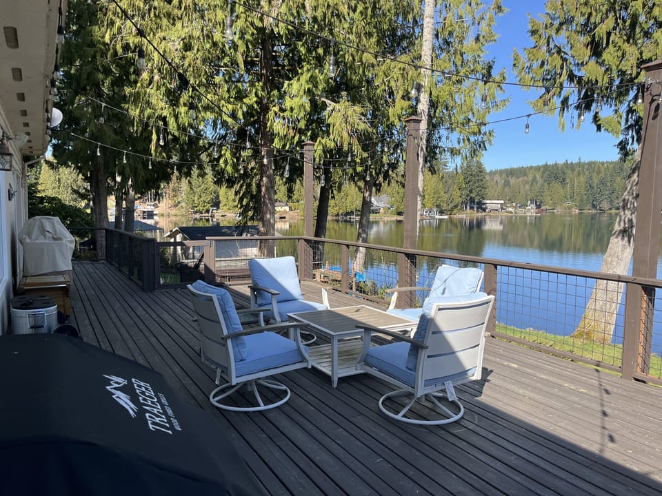 Deck off house close to kitchen, can sit and relax here all day. 