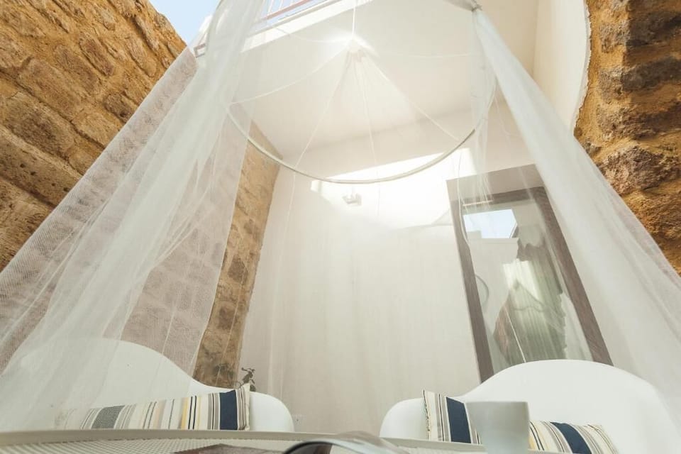 Premium bedding, down comforters, memory foam beds, soundproofing