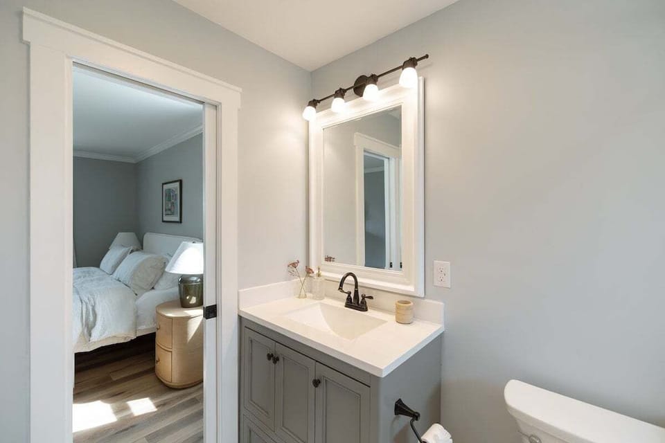 Modern bathrooms stocked with essential toiletries and luxury Missio Hair products sourced locally in Wilmington.