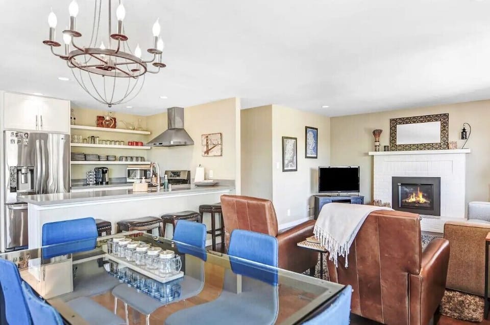 Open concept dinning, living and kitchen area.