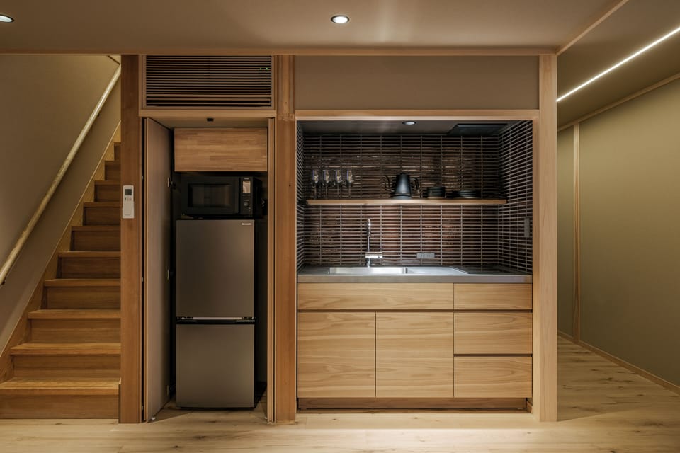 Luxury House | Private kitchen | Full-size fridge, microwave, stovetop, electric kettle