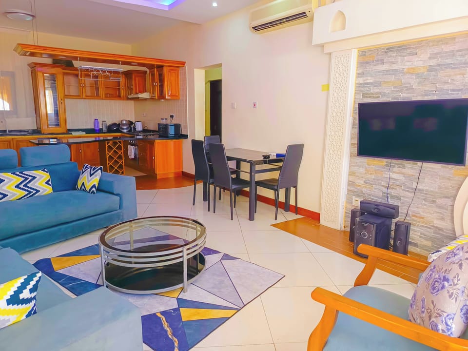 Exclusive Apartment | Living area | 32-inch Smart TV with digital channels