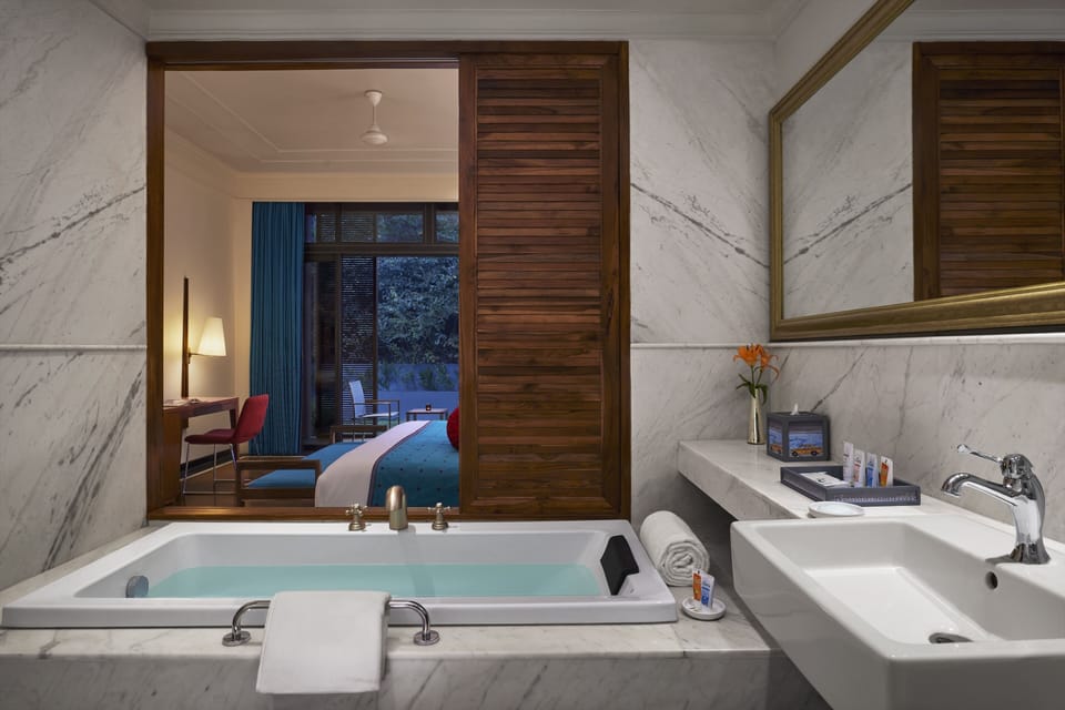 Separate tub and shower, free toiletries, hair dryer, bathrobes