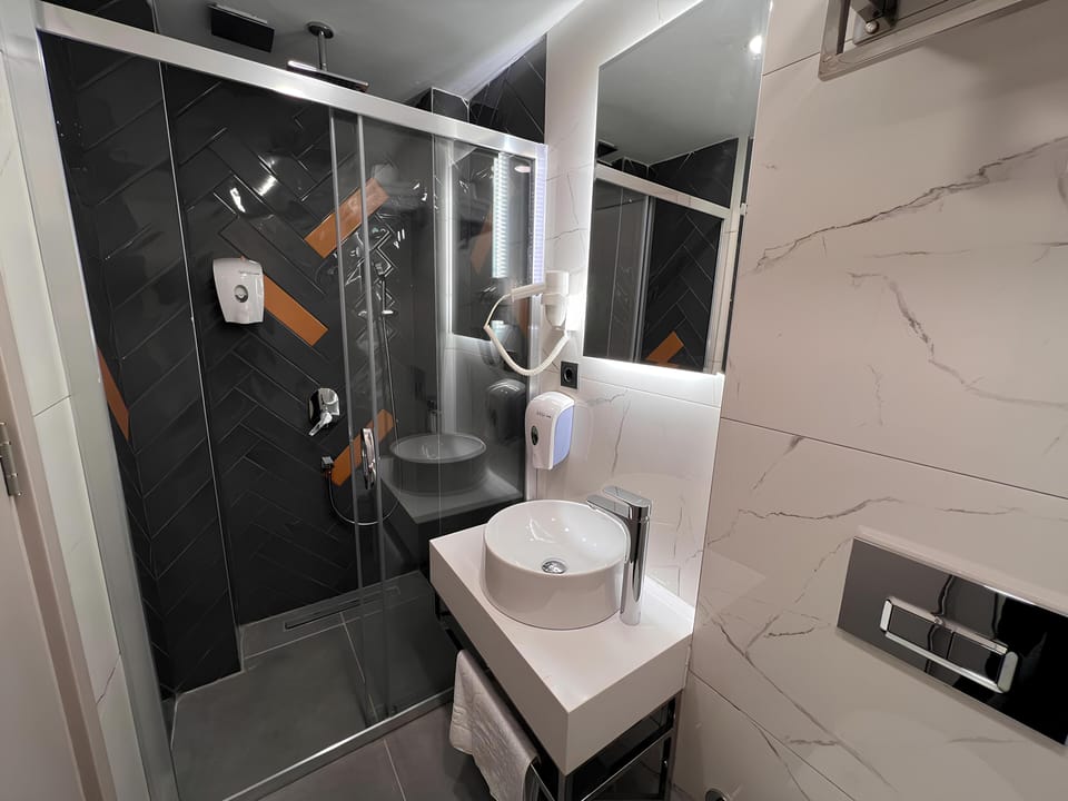 Basic Studio Suite, City View | Minibar, desk, soundproofing, free WiFi