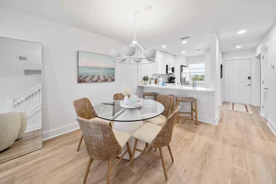Your open dining area flows seamlessly into a modern kitchen, creating the perfect space for memorable meals and conversations.
