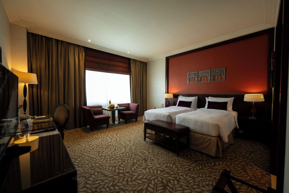 Frette Italian sheets, premium bedding, down comforters, in-room safe