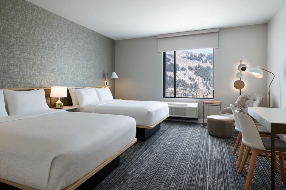 Down comforters, desk, laptop workspace, blackout drapes