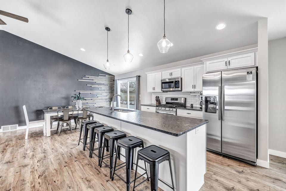 Full stocked kitchen with all basic utensils.  Dishwasher, Range, and Fridge.