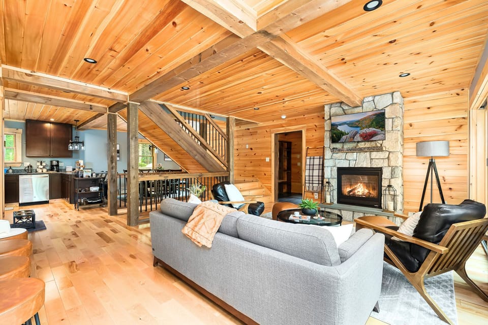 The open floor plan features comfortable spaces that invite gathering.