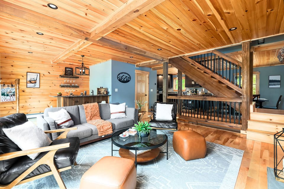 Gather round and share stories and laughs in the cozy living room.