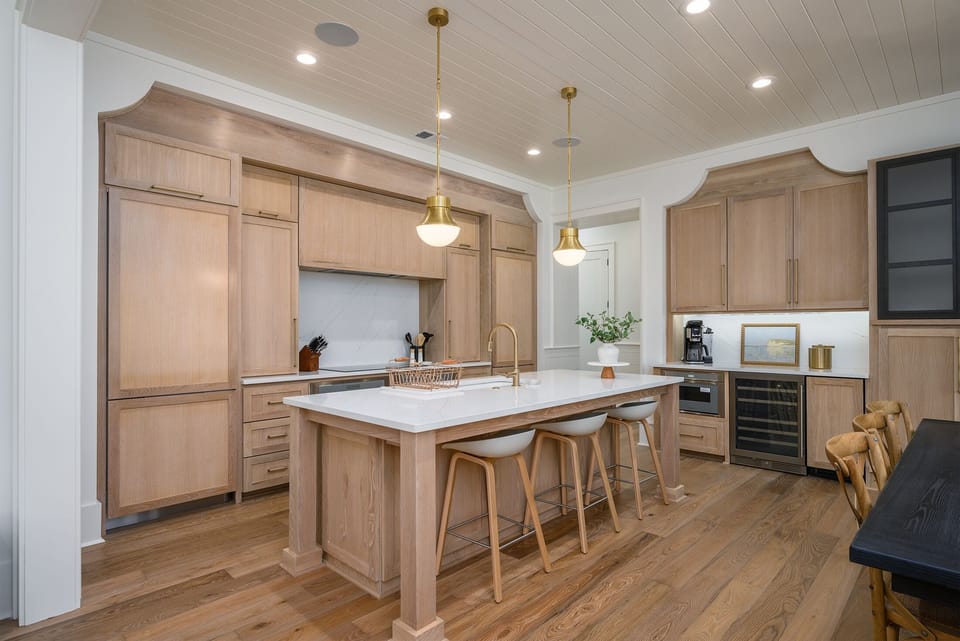 Kitchen features a coffee bar and wine fridge