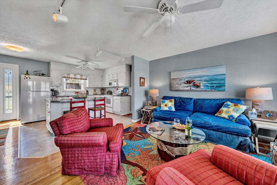 Relax in our spacious living room with cozy seating and a welcoming atmosphere.
