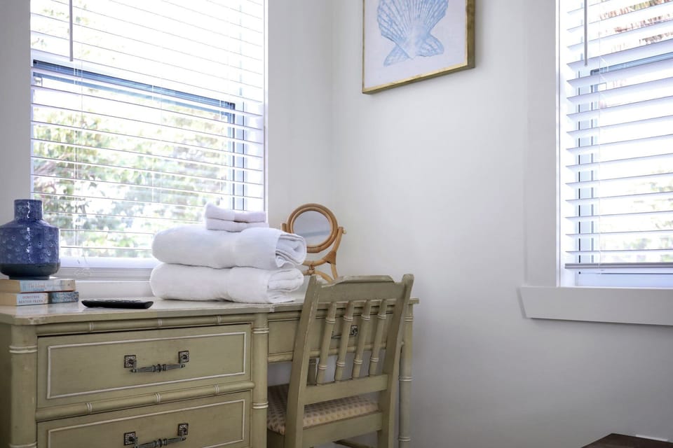 Find the perfect balance between work and relaxation in our cozy queen bedroom, complete with a convenient work station. Whether you're catching up on emails or diving into a passion project, this inviting space offers comfort and productivity in equal measure. Welcome to your peaceful retreat where inspiration flows as freely as the comfort! 💼🖊️ #WorkAndRelax #CozyProductivi...