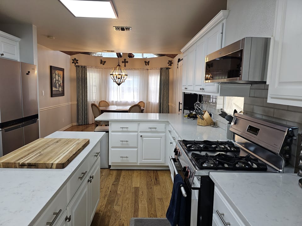 Gas stove - Image does not do this room justice - It's a nice place to cook. 