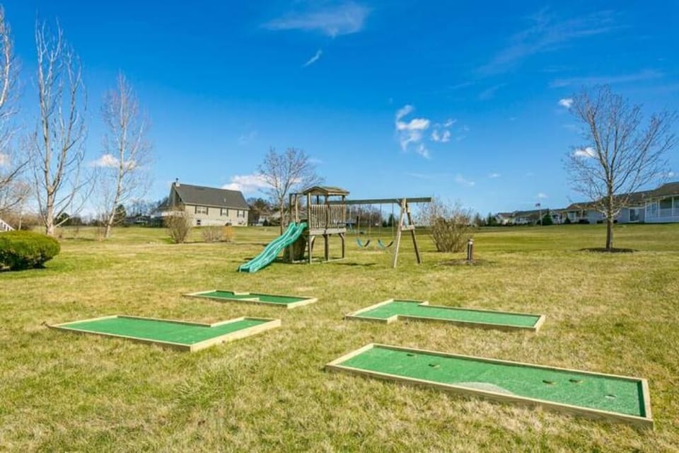 Kid's Swing set and 4-hole putt putt course is fun for everyone! 