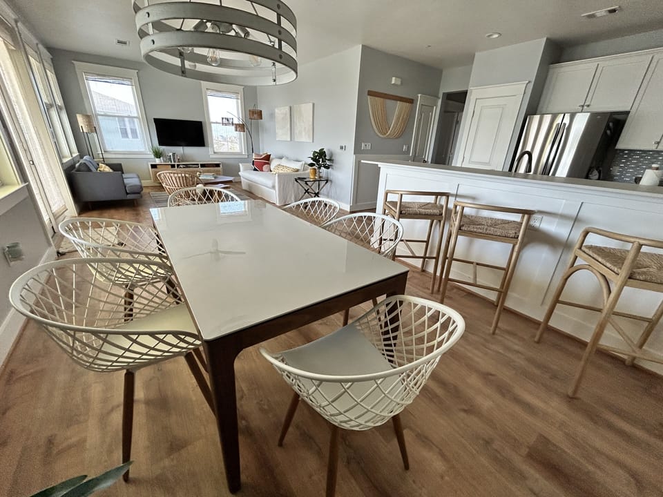 The condo has a large living room, dining area and kitchen combination.