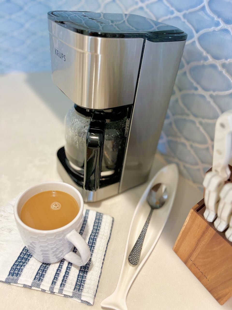 Thea unit has a full size coffee maker or coffee by the cup.