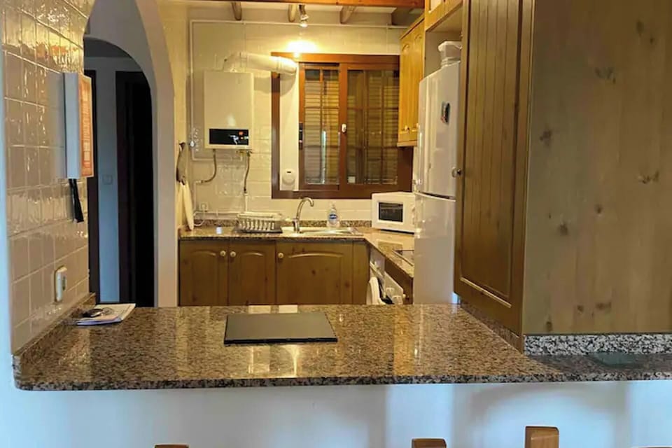 Semi Open Plan Kitchen Diner.  The kitchen is fully equipped with Dish Washer and Washing Machine
