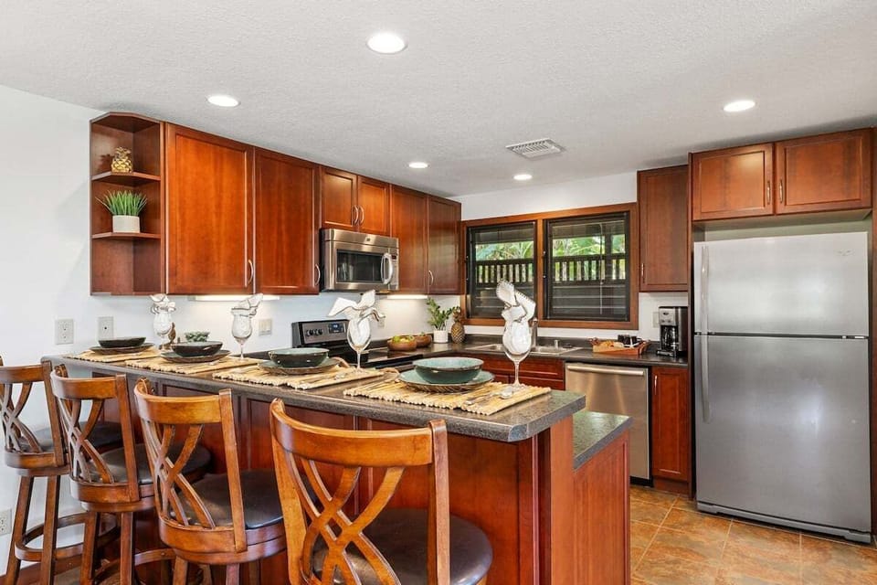 Gather around the kitchen island for cocktails and conversation