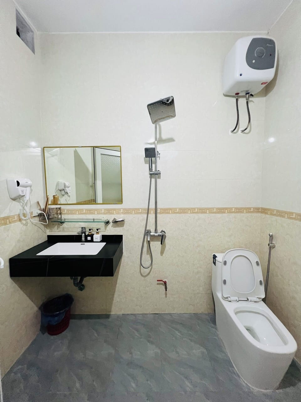Shower, free toiletries, hair dryer, slippers