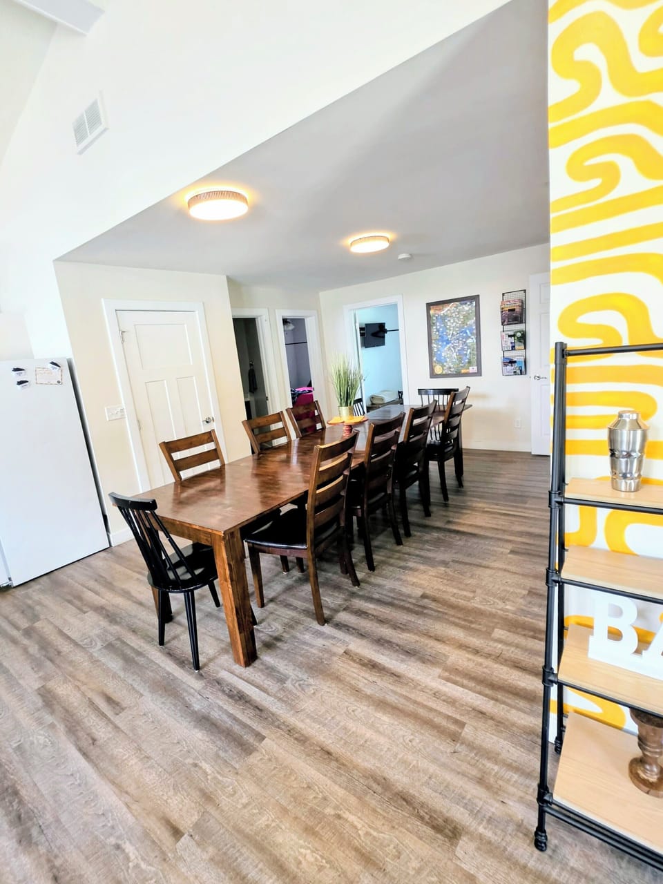 Dining room is by 2 bathrooms and 3 bedrooms. 