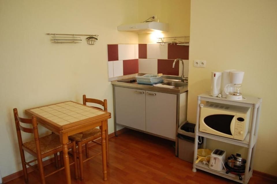 Mini-fridge, microwave, stovetop, electric kettle