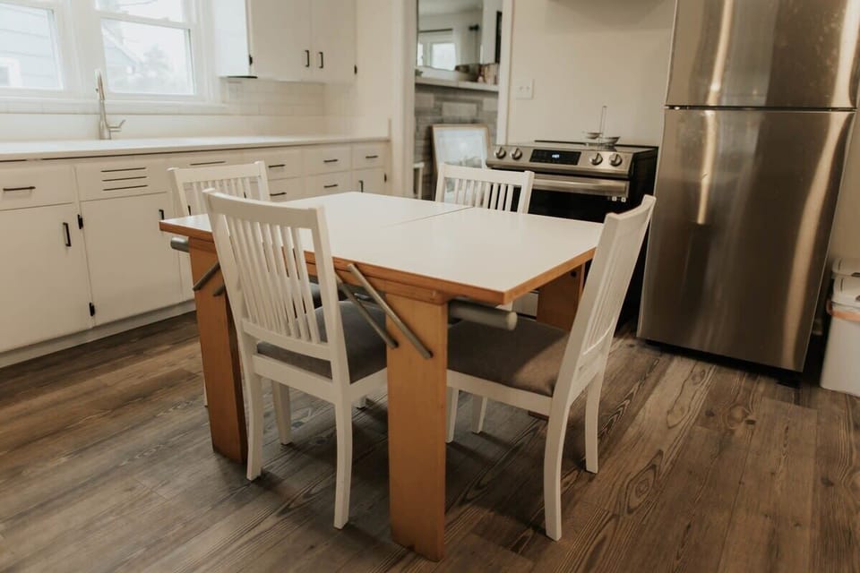 Elevate your dining experience with our charming four-seater dining table, perfect for intimate meals and lively conversations with loved ones.