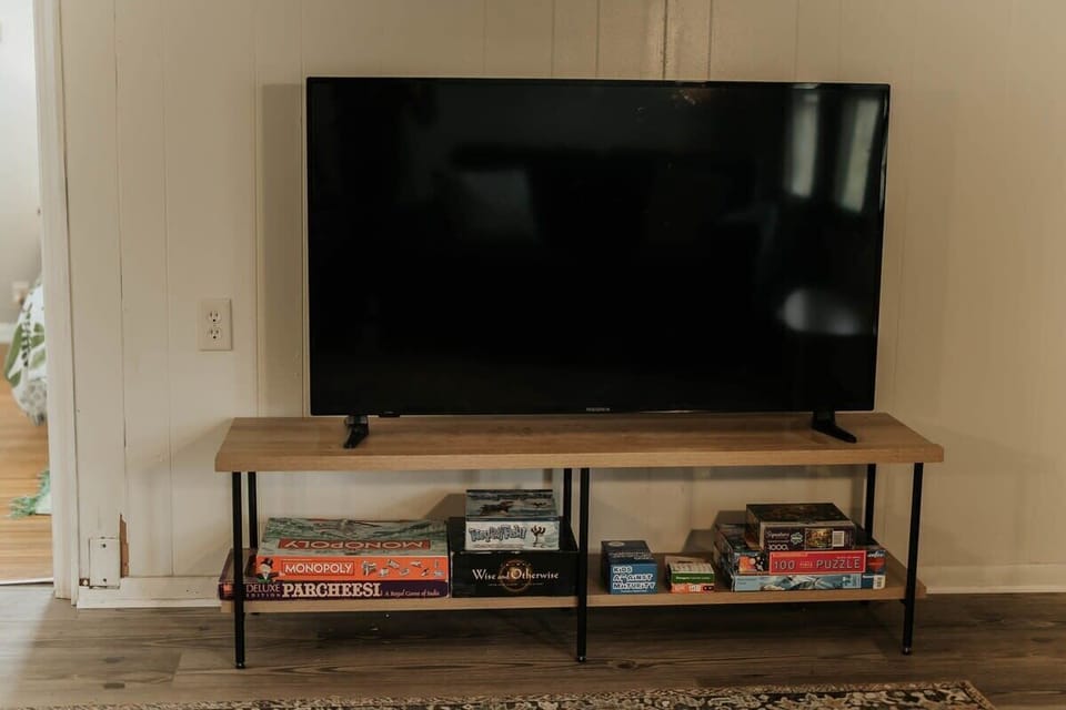 Enjoy your favorite shows and movies on our sleek TV, adding entertainment and comfort to your stay.