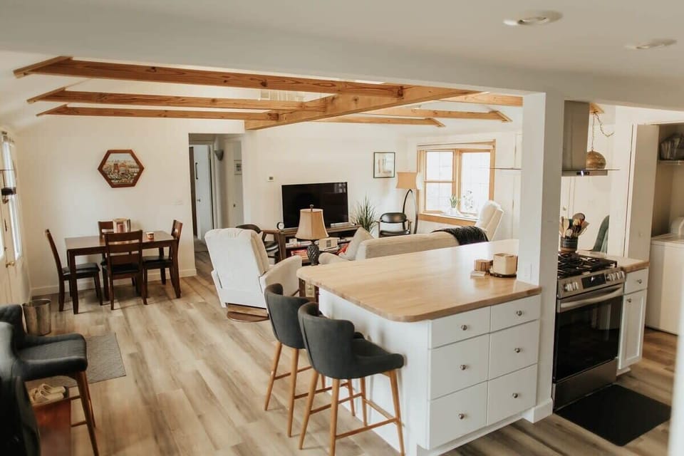 Behold our elegant kitchen cabinets, meticulously crafted to exude sophistication and style. Adorned with sleek appliances including a microwave and coffee maker, along with a selection of sharp knives and other essential kitchen items, our kitchen is a haven for culinary enthusiasts. Whether you're brewing your morning coffee or preparing a gourmet feast, our kitchen provides the perfect back...