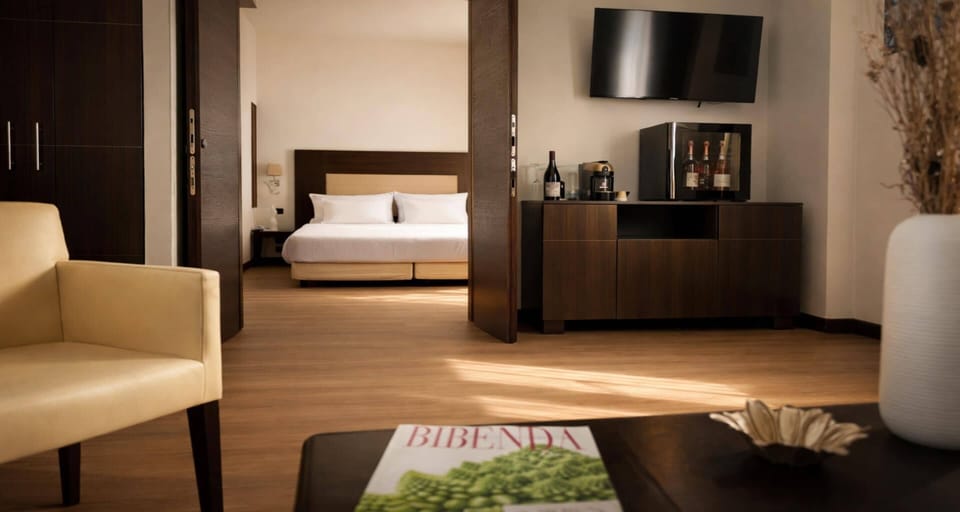 Suite, 1 King Bed, Non Smoking | In-room safe, blackout drapes, soundproofing, free WiFi