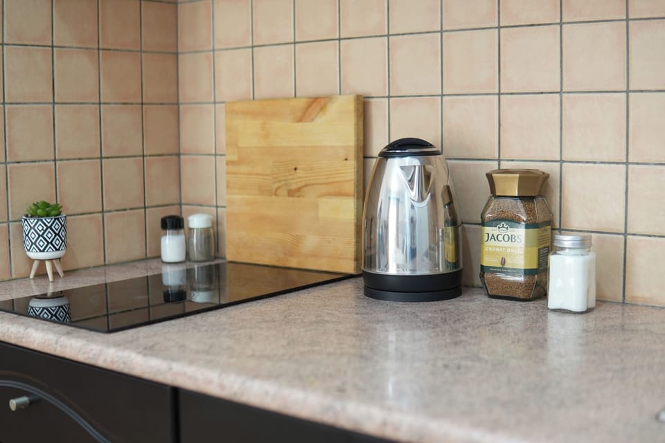 Family Studio, Balcony | Private kitchen | Stovetop, coffee/tea maker, electric kettle, cleaning supplies