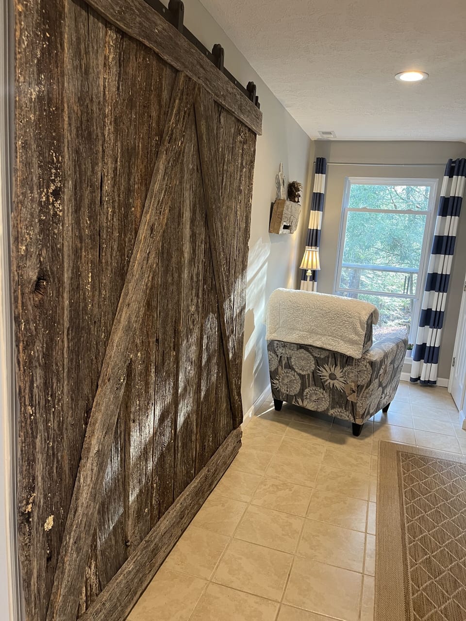 Comfy chair sitting and reading area overlooking the stream.