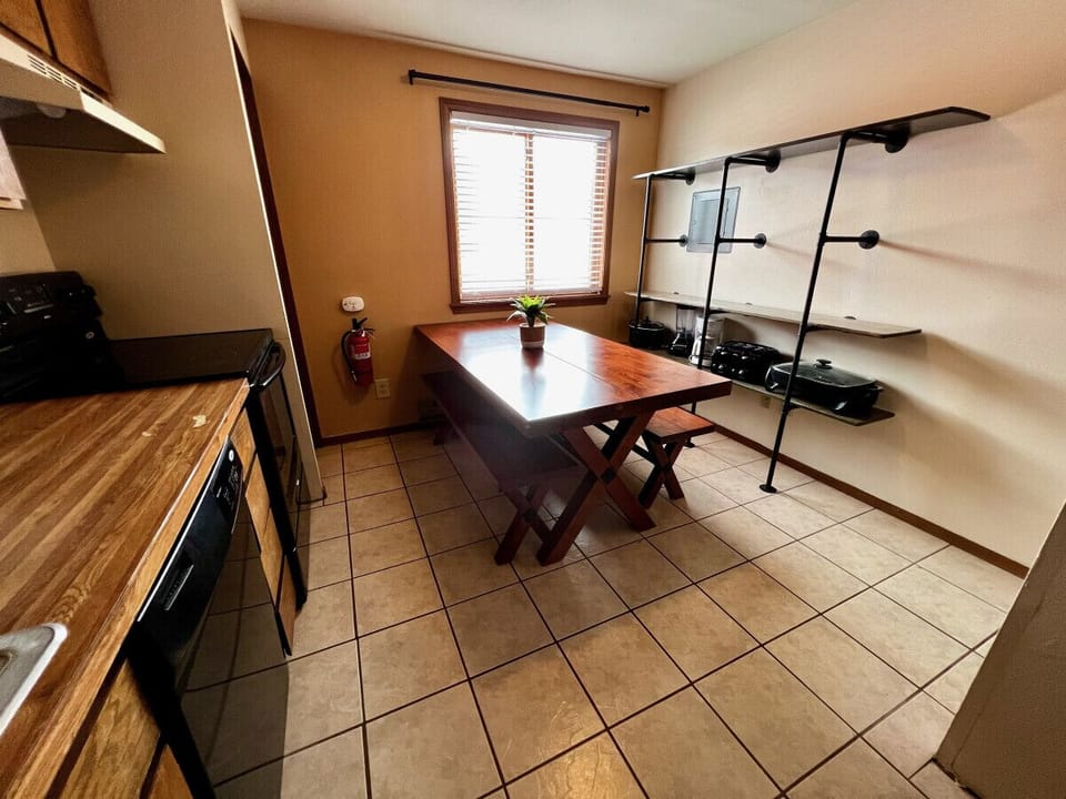 Unit 1 Dining area includes a lot of shelf space for all of your items from home.
