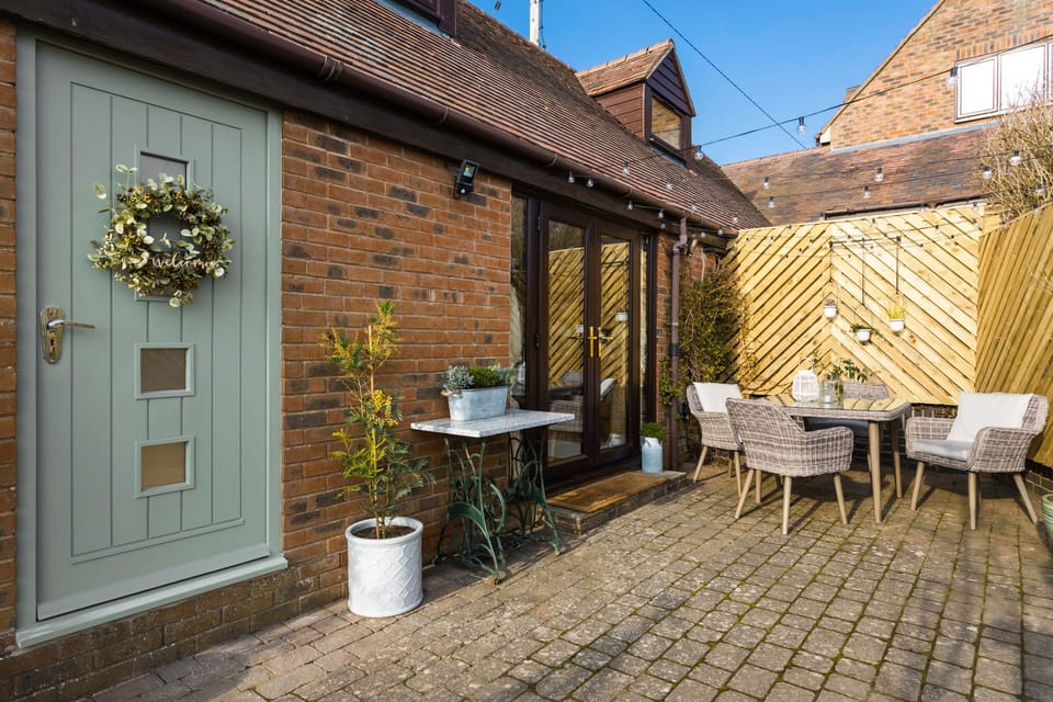 French doors lead from the kitchen to the courtyard patio