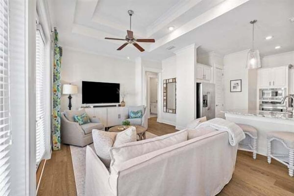 Gather around for movie nights or relax after a long beach day in this inviting space.