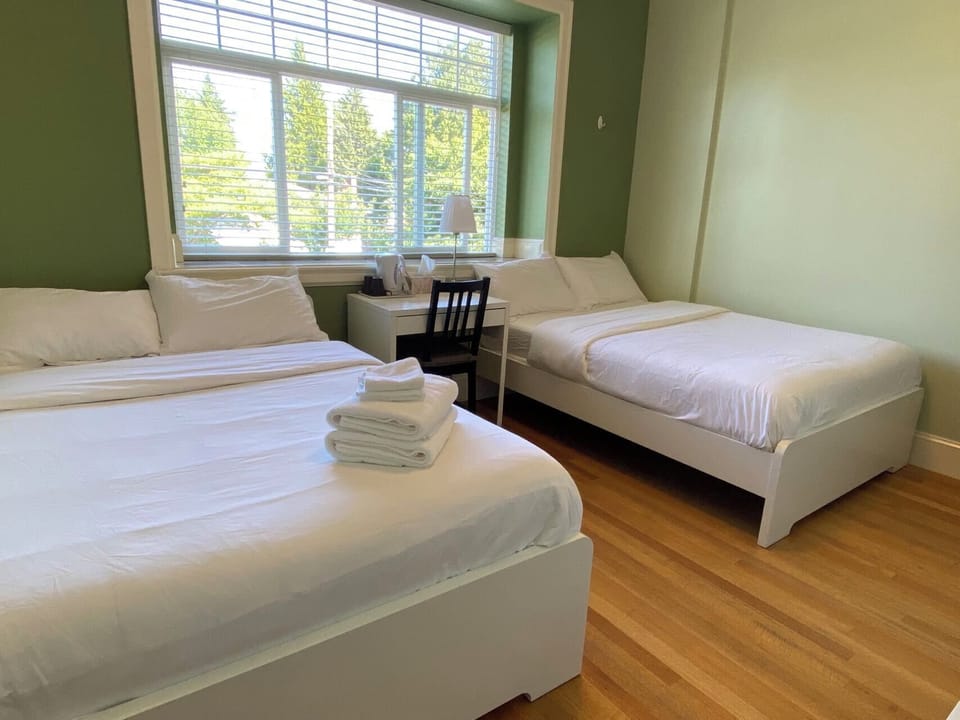 Deluxe Quadruple Room, 2 Queen Beds, Private Bathroom (Room G) | Desk, free WiFi, bed sheets