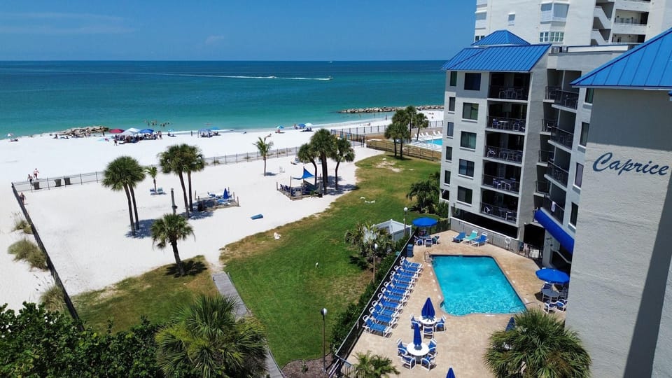 Condo, Multiple Beds (Caprice 301) | Pool | A heated pool