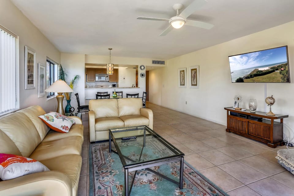 Condo, 1 King Bed with Sofa bed (Land's End 11-207 Beach Front) | Living area | TV
