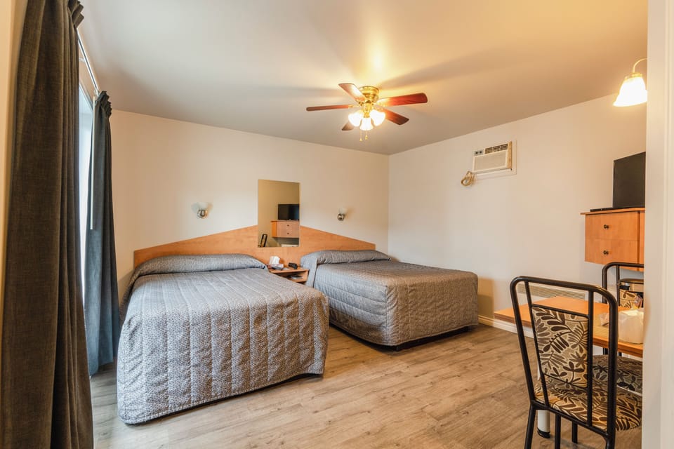 Desk, laptop workspace, free WiFi, bed sheets