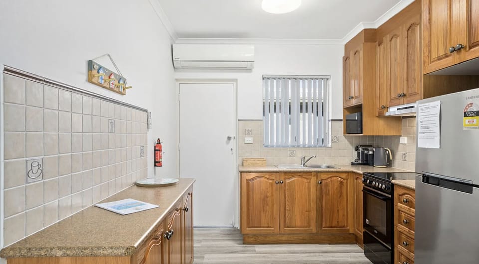 Open Kitchen, Dining & Living Area.