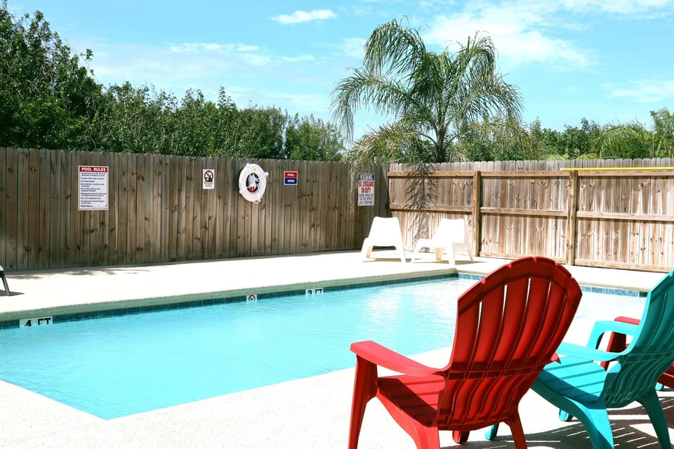 Full size pool with lounge furiture