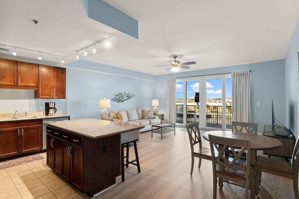Fully Stocked Kitchen with Island Bar Seating, Stainless Steel Appliances and Drip Coffee Maker