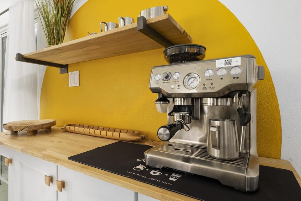 Elevate your mornings and experience coffee bliss in our home's coffee haven.