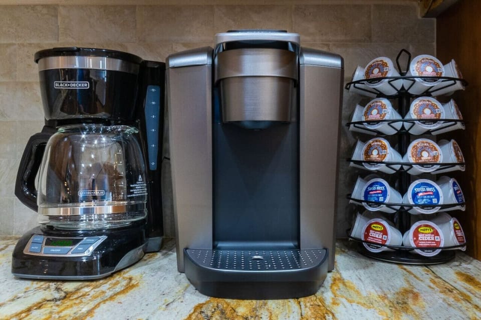 Drip and Keurig coffee makers are provided along with everything you need for a cup of coffee to start your day!